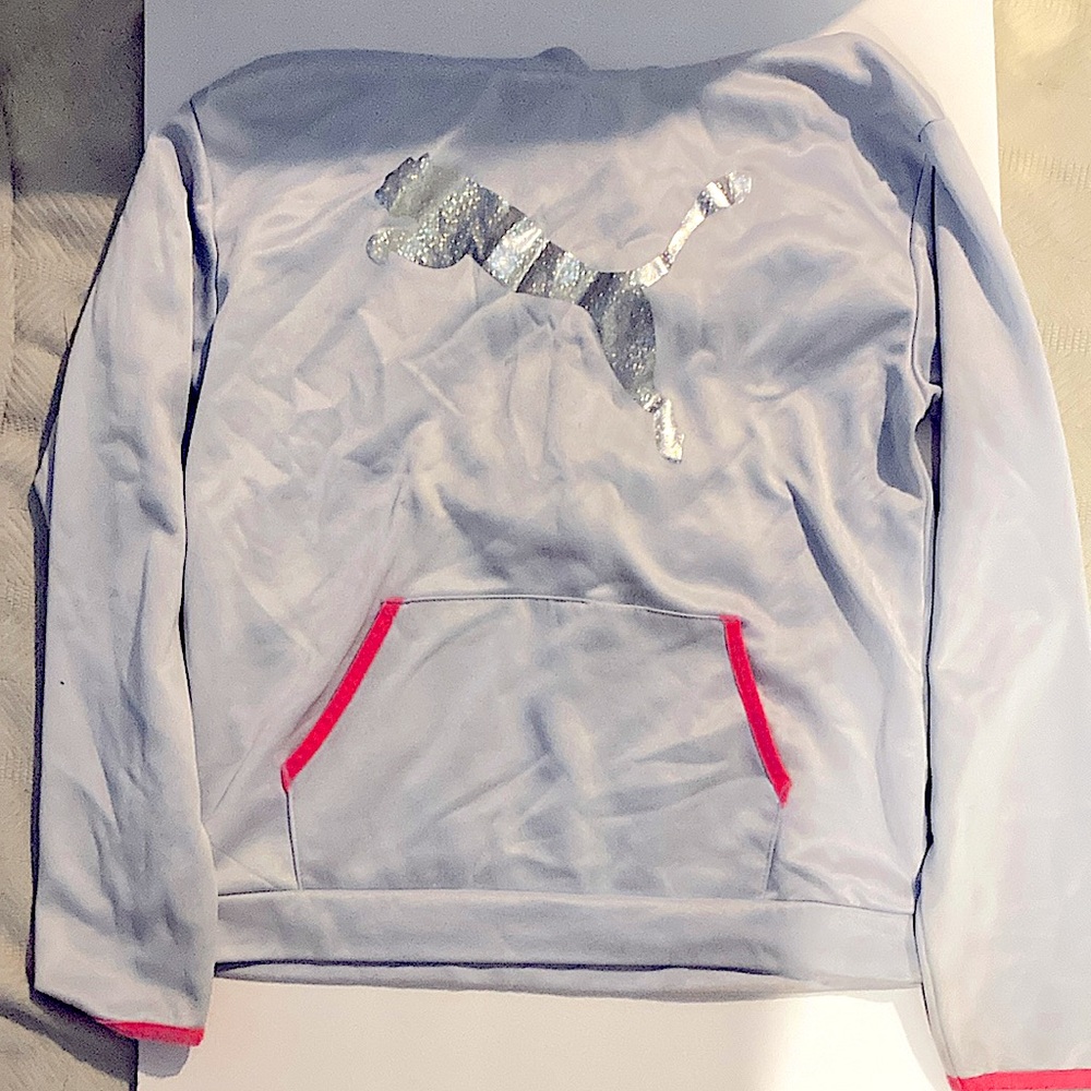 A used puma kids sweat shirt.